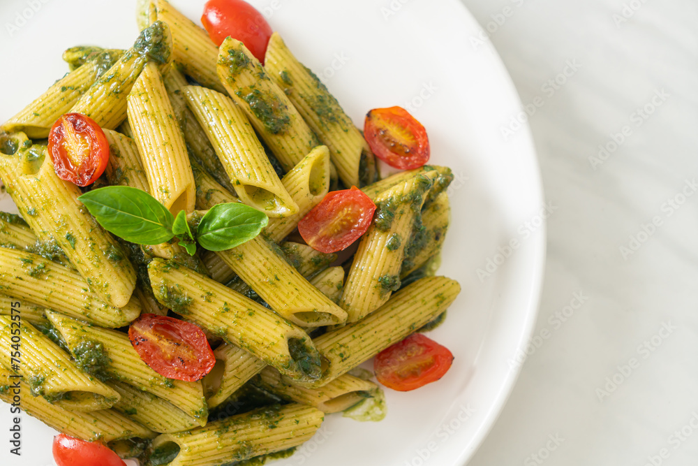 Canvas Prints penne pasta with pesto sauce and tomatoes