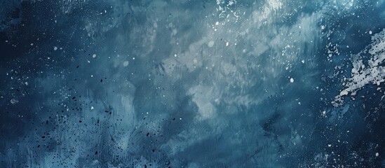 The water in the image appears dark and blue in color. It reflects the sky above and creates a serene atmosphere. The deep blue hue adds a sense of mystery and depth to the scene.