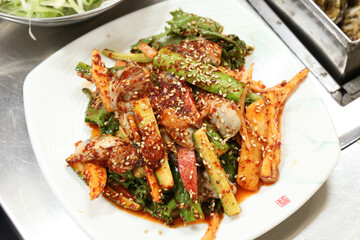 Korea style food. Raw Oyster spicy sauce Salad