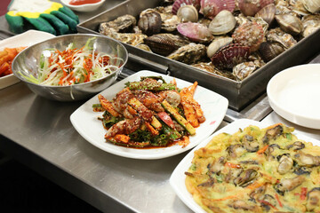 Korea style food. Raw Oyster spicy sauce Salad