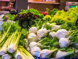 Fresh vegetables and fruits displayed in the Food market in the center of Bologna, Italy. 
