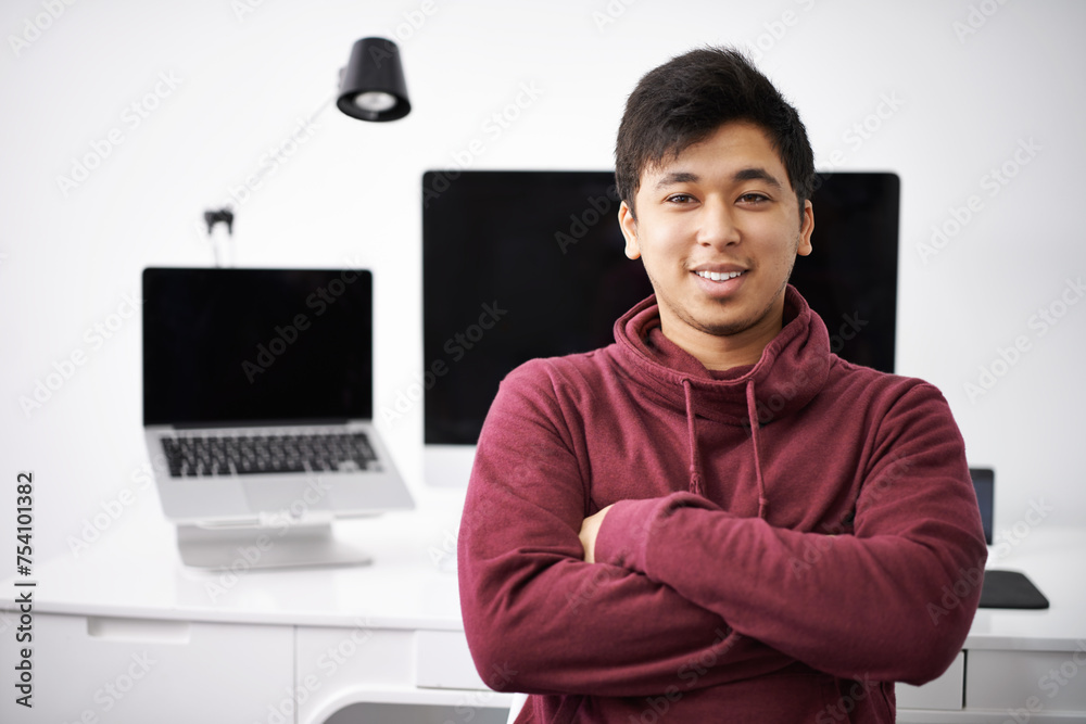 Poster Laptop, portrait and smile of man for software in office with information technology for cybersecurity. Coder, programmer and male person with arms crossed in workplace with monitor of computer