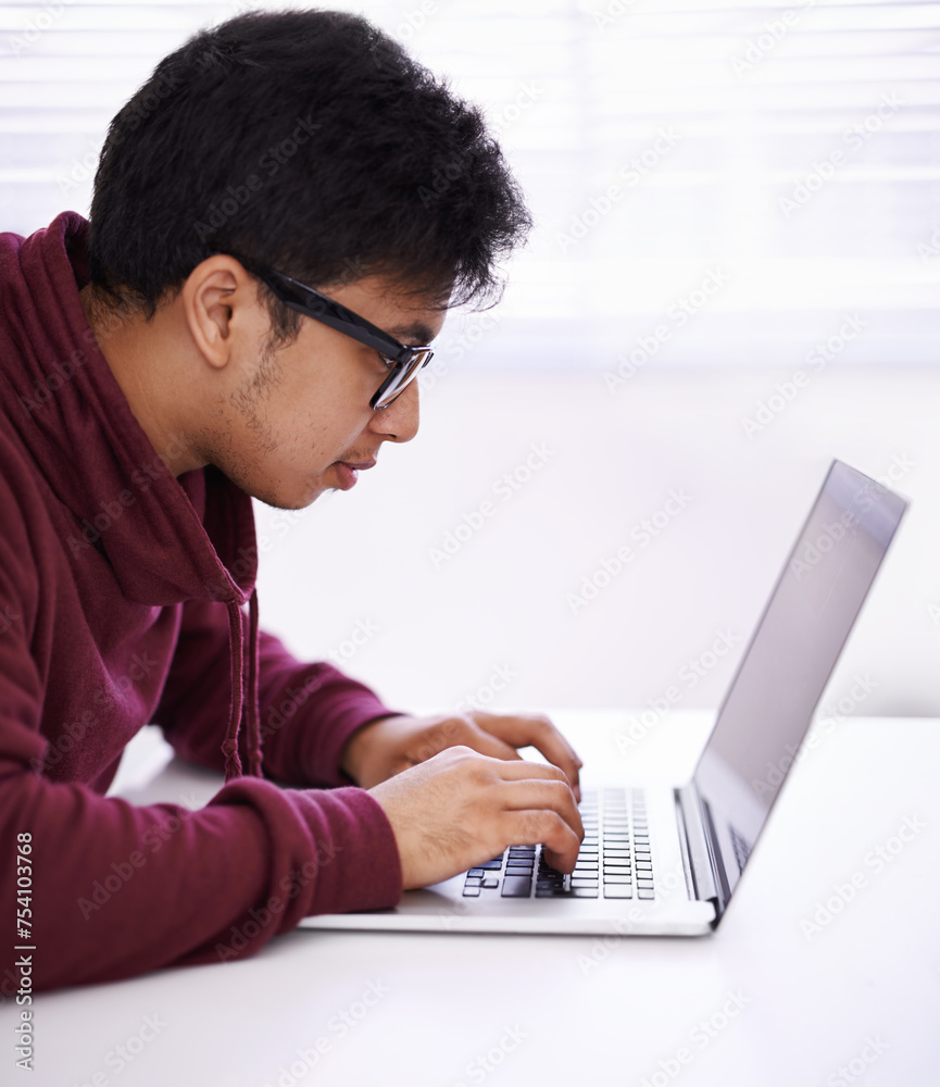 Aufkleber man, focus and typing with laptop for research, development or creative startup on table at office d