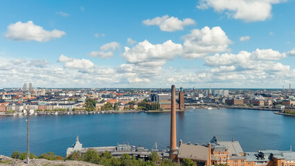 Fototapeta na wymiar Stockholm, Sweden. Stockholm City Hall and Lake Malaren. Panorama of the city. Summer day, Aerial View