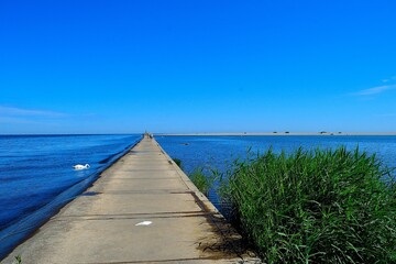 Obraz premium Pier in the Wisla estuary, Poland, Baltic Sea
