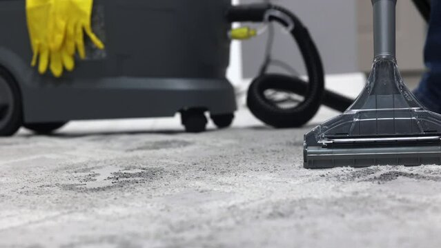 Kercher cleans the carpet with water in the children's room. Killing germs and disinfecting carpet from house dust and pet hair