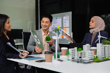 Businessman team brainstorming using tablet, laptop computer for working technology and business,  Renewable energy-based green businesses and global warming. Reduce CO2 emission.
