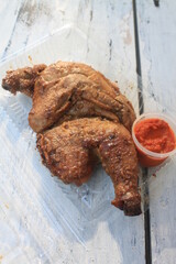 Indonesian food called bolu kukus in a paper cup on the table