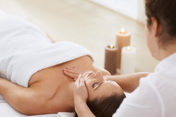 Woman, massage and physical therapy or relax spa treatment at holiday resort or luxury care,...