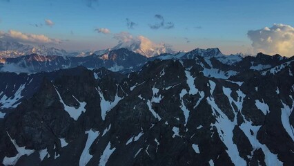 Mountain beautiful nature veiled in snow and clouds offers serene escape Revel in mountain nature's rugged slopes pristine north beauty. Mountain nature's allure primal call to explorers.