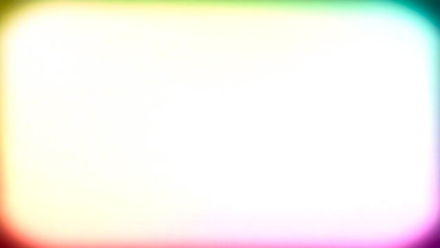 Soft focus, rainbow-colored gradient background with vignetting effect