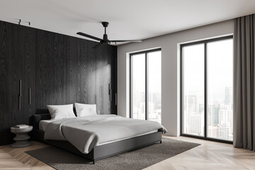 Modern hotel bedroom interior with bed and decoration, panoramic window