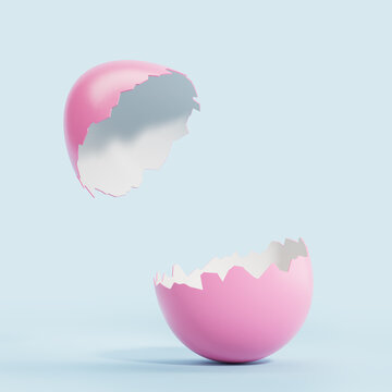 Broken pink egg on empty copy space background