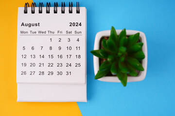 Month, time and calendar concept. Calendar for month of August 2024. On blurred styled background.