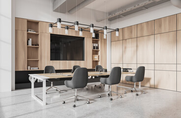 Cozy meeting interior with table and chairs, tv display and shelf with folders