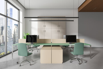 Stylish business interior with pc monitors on desk, shelf near panoramic window