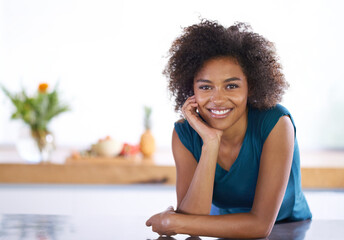 Portrait, smile and afro with black woman in kitchen of home as real estate agent for house...
