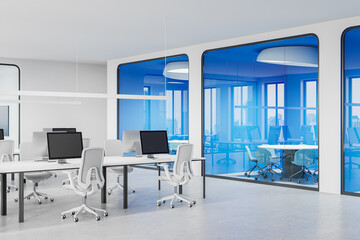 Office interior with coworking and glass meeting boxes with minimalist furniture