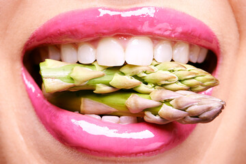 Woman, lipstick and closeup of vegetables in mouth for beauty, nutrition and healthy with vegan...