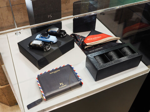 TOKYO, JAPAN - May 4, 2023: Products by Ines de la Fressange and models of DS Automobiles cars on display in Takashimaya department store in Tokyo.