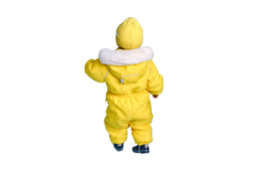 Happy toddler baby in winter clothes snowsuit isolated on a white background. A child in a warm yellow jumpsuit with a hood. Kid aged one year five months