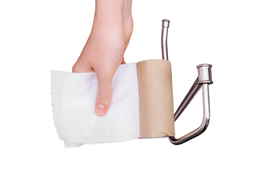 Hand holding the sleeve from the finished toilet paper, a fun concept, isolated on a white background. Coronavirus quarantine and isolation in the event of an influenza epidemic