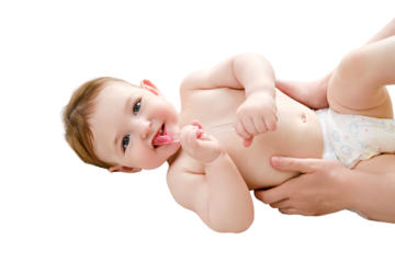 A mother teaches a happy toddler baby boy to brush his teeth, isolated on a white background. Kid aged one year