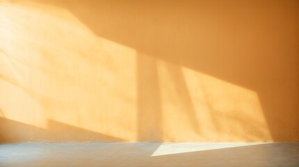 Mellow sunlight creating geometric shadows on textured orange wall against smooth floor 