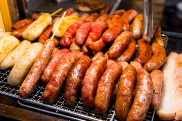 Vendor selling sausage in the street market