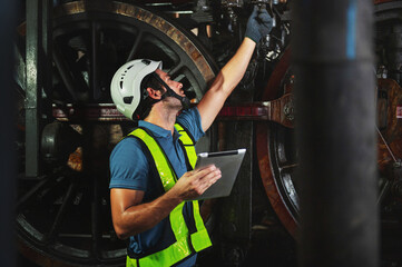 maintenance engineer working operating machines in industry factory - obrazy, fototapety, plakaty