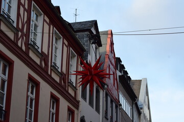 urban Christmas decoration in front of half-timbered buildings
