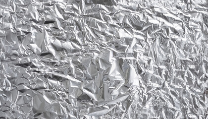 Shiny silver foil texture background, pattern of white grey wrapping paper with crumpled and wavy.