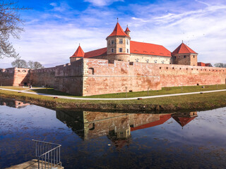 Water reflection with Fagaras Citadel Fortress in Brasov Romania
