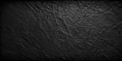 photo texture of old paper in black hue background