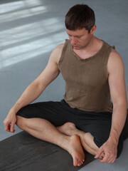 Meditation concept. Yoga man doing breathing exercises. Calm , Stress relief , Body Mind connection