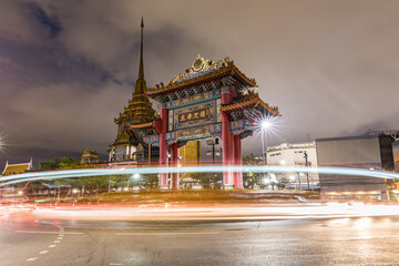 Nighttime traffic at bangkok's iconic royal arch - 754221567