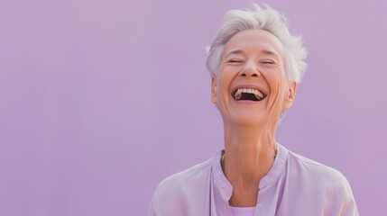 An elderly woman's laughter lights up the lavender backdrop, showcasing a carefree spirit and love for life in her relaxed attire.