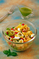 Salad with pasta and almond pesto.