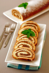 Swiss roll with walnuts.