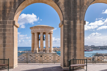 The Siege Bell War Memorial seen from Lower Barrakka Gardens, Valletta, Malta