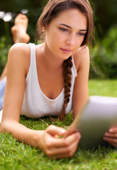 Backyard, grass and woman relax with tablet, outdoor and garden in home for peace with technology. Summer, nature and girl online with connection to internet to read ebook on app for happiness
