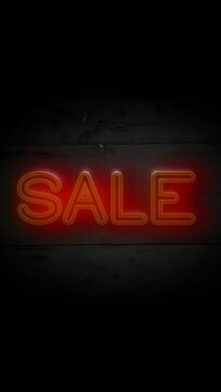 "SALE" slogan on the vintage wooden bacground |  vertical format