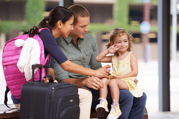 Suitcase, travel and family in city street for bus stop, road trip or bonding with crying daughter. Love, journey or sad kid upset with parents outdoor for adventure, vacation or waiting for taxi