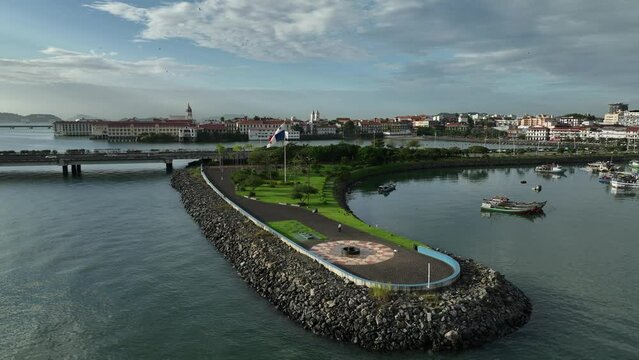 Footage of the stone pier in Panama City, with the Panamanian flag standing on it