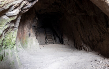 exit from a stone cave in the mountains of Bayanaul
