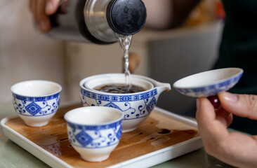 traditional chinese tea ceremony at home, with tea utensils