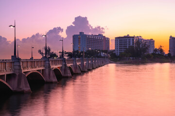 San Juan Sunrise Cityscape over Puente Dos Hermanos Bridge, opened in 19010, connecting Condado...