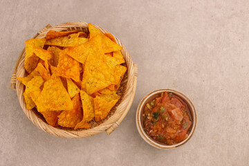 Tortilla or Nachos and Salsa Sauce. 