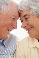 Couple, senior and forehead touch for care, home and relax together for bonding and smile. Elderly...