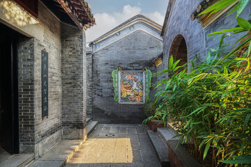 China, Foshan city Guangdong province. Shunde Qinghui Garden is ranked among the top ten gardens of China. Richly decorated ancient walls, typical Lingnan architectural style.